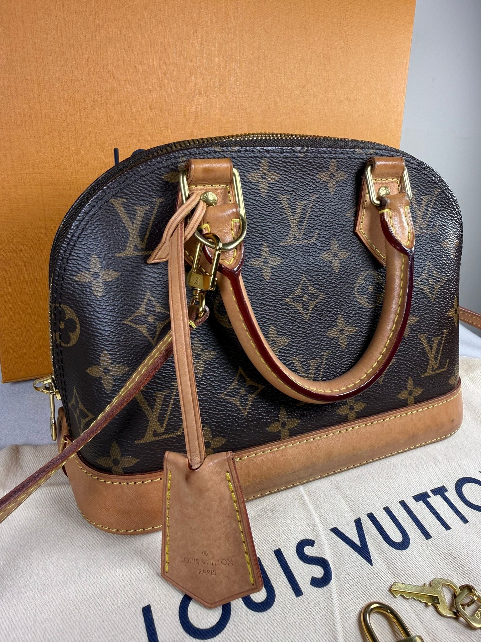 Louis Vuitton Alma BB Monogram Canvas Crossbody Bag